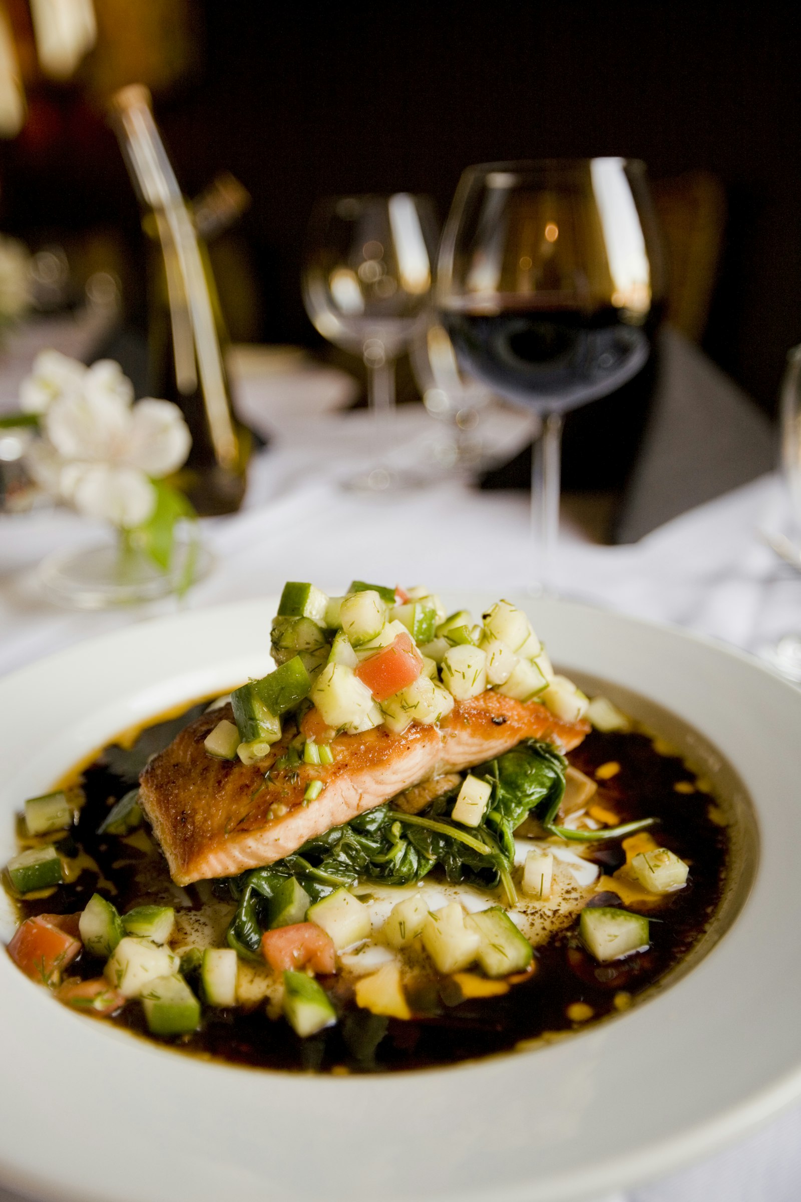 Cedar-smoked trout portion with herbs